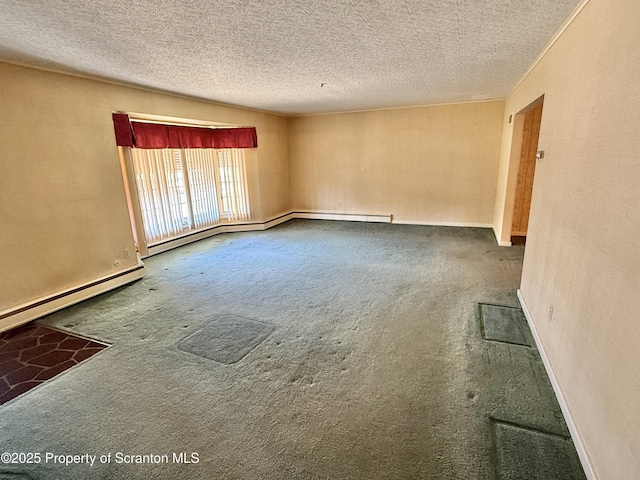 carpeted spare room with a baseboard radiator and a textured ceiling