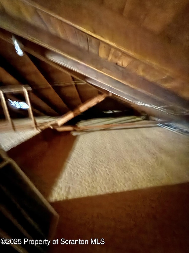 view of unfinished attic