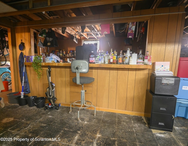 bar with wood walls and a dry bar