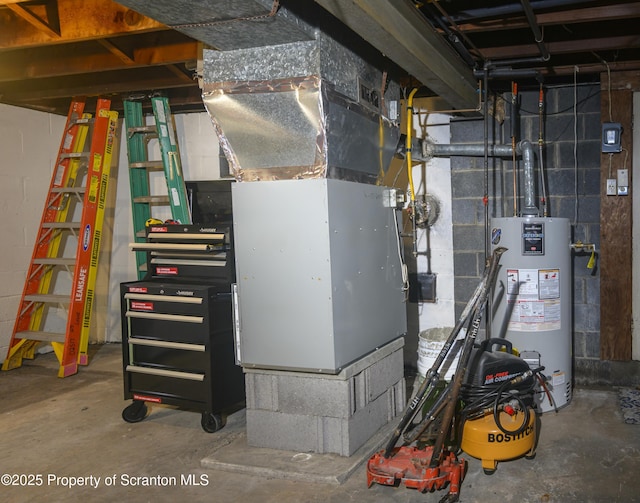 utility room with gas water heater