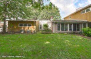 exterior space with a sunroom