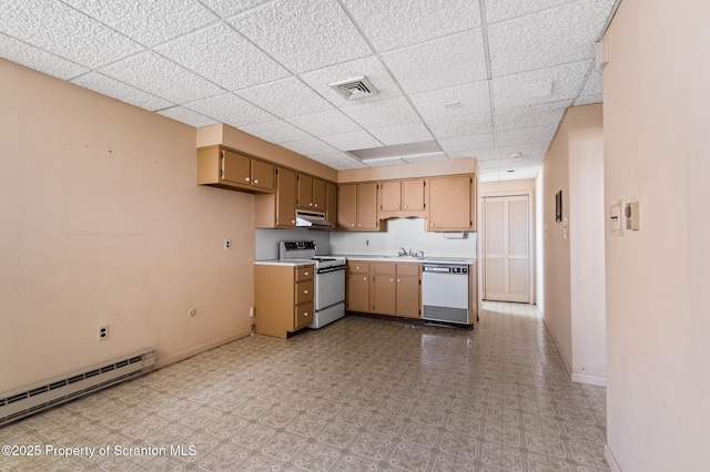 kitchen featuring under cabinet range hood, light countertops, baseboard heating, white appliances, and a sink