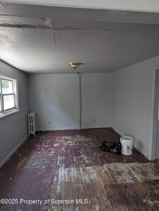 819 Luzerne St, Scranton, PA 18504 - unfurnished room with radiator and hardwood / wood-style floors