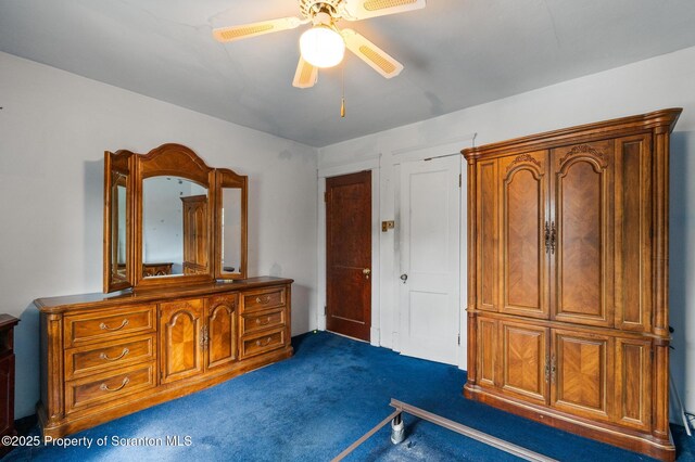 347 Orchard St, Old Forge, PA 18518 - bedroom featuring ceiling fan and dark colored carpet