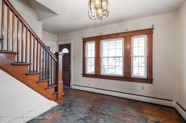 347 Orchard St, Old Forge, PA 18518 - entryway featuring a baseboard heating unit, stairway, a baseboard radiator, and an inviting chandelier