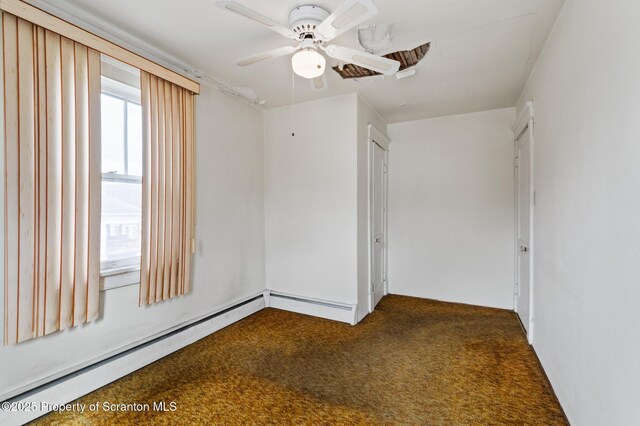 347 Orchard St, Old Forge, PA 18518 - interior space featuring baseboard heating, a ceiling fan, and carpet floors