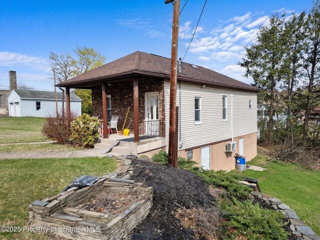 347 Orchard St, Old Forge, PA 18518 - view of front of property featuring a porch and a front lawn