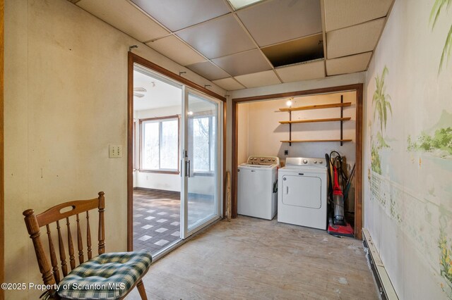 347 Orchard St, Old Forge, PA 18518 - laundry room with washing machine and dryer, laundry area, and baseboard heating