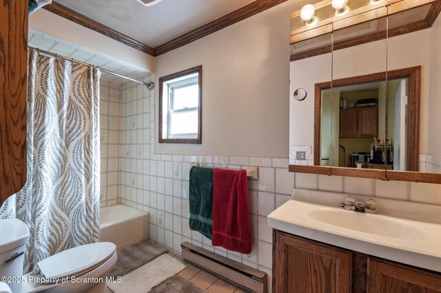 347 Orchard St, Old Forge, PA 18518 - full bathroom featuring ornamental molding, toilet, tile walls, a baseboard radiator, and shower / bathtub combination with curtain