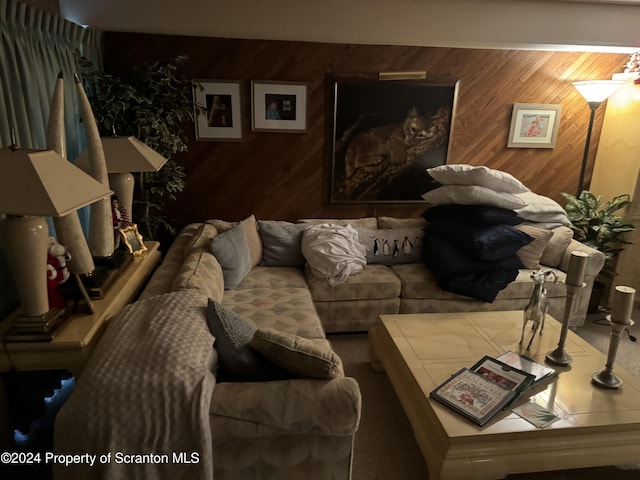 living room with wooden walls