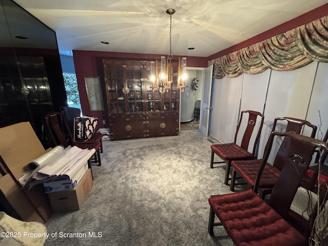 interior space with a chandelier and carpet