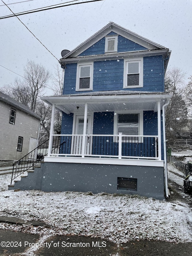 view of front of property featuring a porch