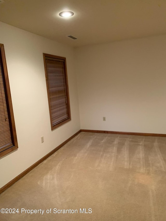 empty room featuring carpet floors