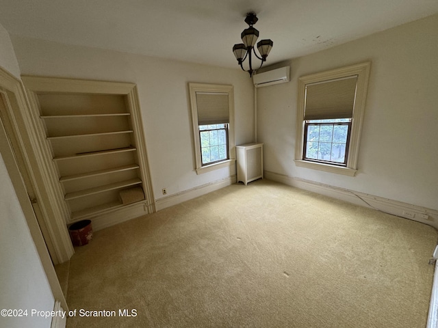 interior space featuring a wall mounted air conditioner, light colored carpet, and radiator