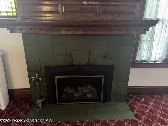 room details with a tiled fireplace