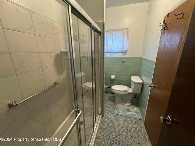 bathroom with an enclosed shower, baseboard heating, tile walls, tile patterned flooring, and toilet