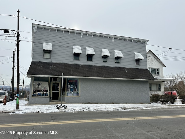 view of snow covered building