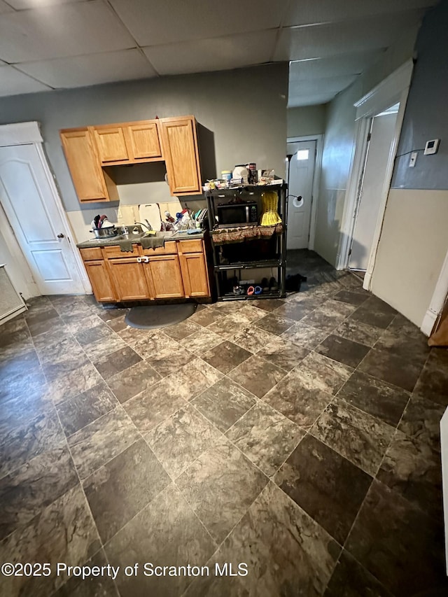 kitchen with a drop ceiling