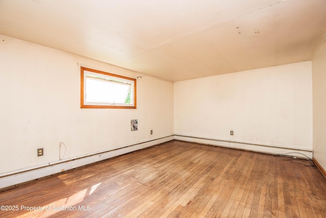 517 Emmett St, Scranton, PA 18505 - empty room with hardwood / wood-style floors and baseboards