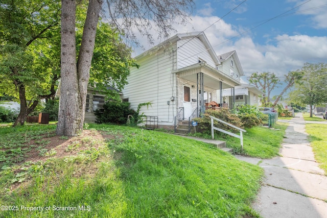 517 Emmett St, Scranton, PA 18505 - view of front of home with a front lawn
