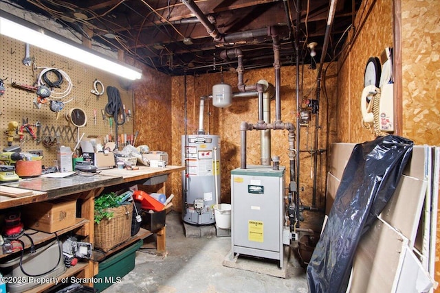 126 Crown Ave, Scranton, PA 18505 - unfinished below grade area featuring gas water heater, a workshop area, and a heating unit