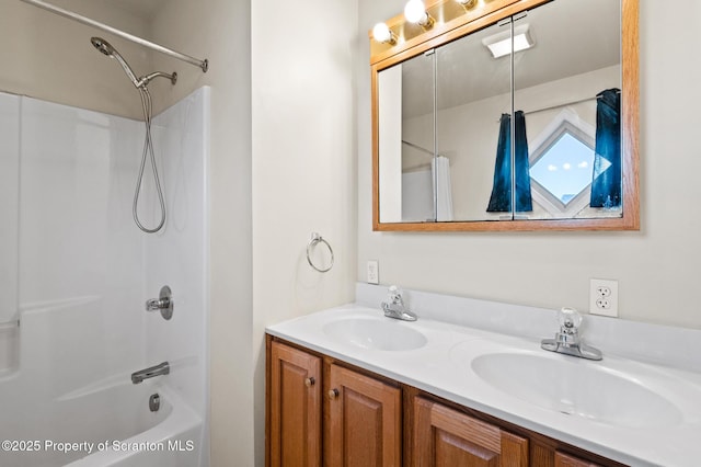 bathroom featuring vanity and tub / shower combination