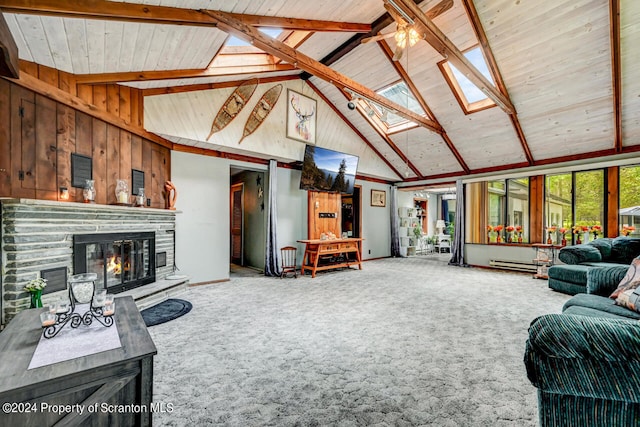 living room with a skylight, wooden walls, a baseboard radiator, high vaulted ceiling, and beamed ceiling