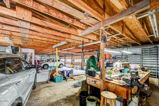 interior space featuring a workshop area