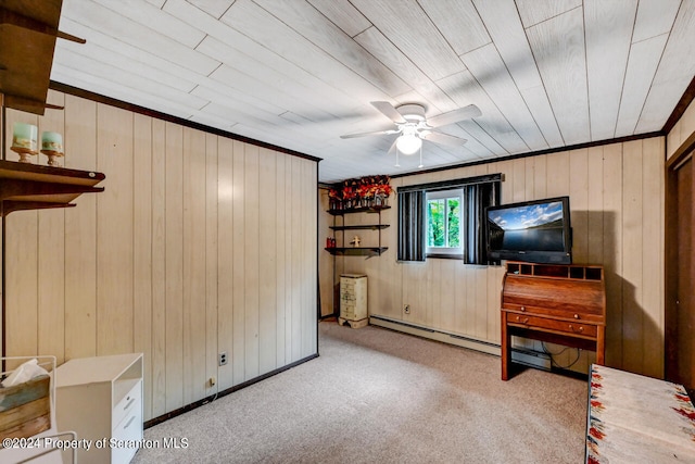 carpeted living room with wooden ceiling, ceiling fan, crown molding, and wood walls