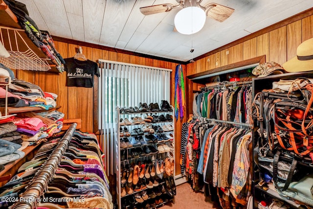 walk in closet featuring carpet floors