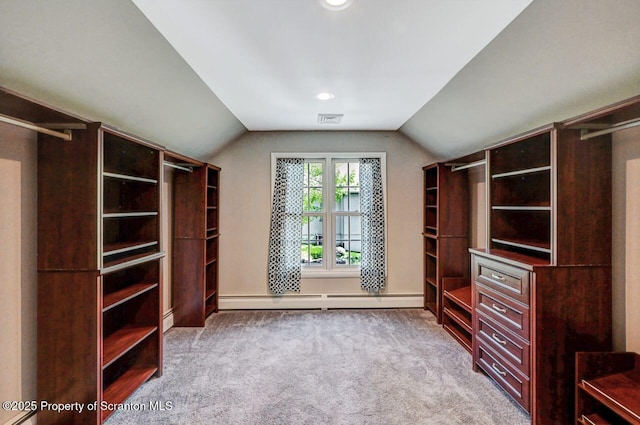 27 Emerson Dr, Moosic, PA 18507 - walk in closet with a baseboard heating unit, vaulted ceiling, and carpet flooring