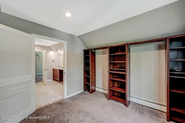 27 Emerson Dr, Moosic, PA 18507 - unfurnished bedroom with baseboard heating, vaulted ceiling, carpet, recessed lighting, and baseboards