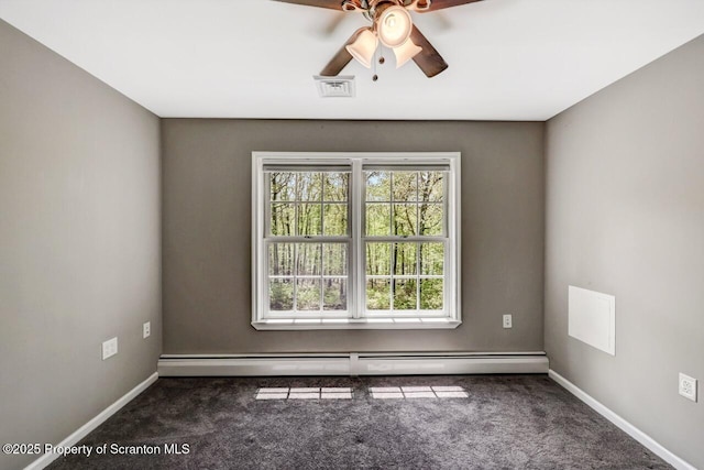 27 Emerson Dr, Moosic, PA 18507 - unfurnished room featuring healthy amount of natural light, carpet floors, and a baseboard radiator