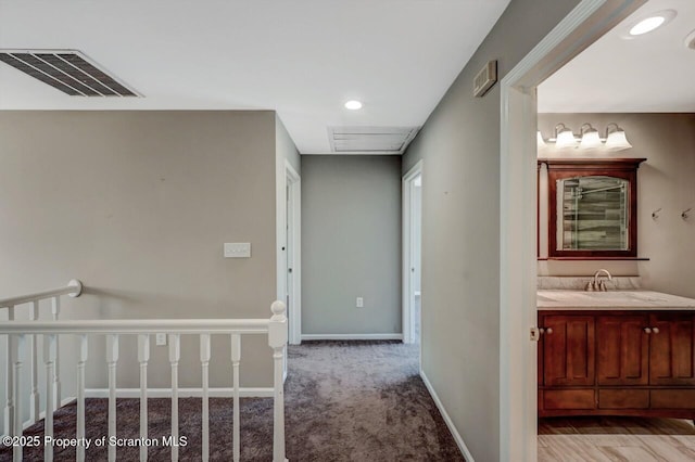 27 Emerson Dr, Moosic, PA 18507 - hall featuring a sink, carpet, recessed lighting, and baseboards