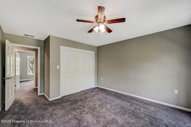 27 Emerson Dr, Moosic, PA 18507 - unfurnished bedroom with a baseboard radiator, carpet flooring, baseboards, and a closet