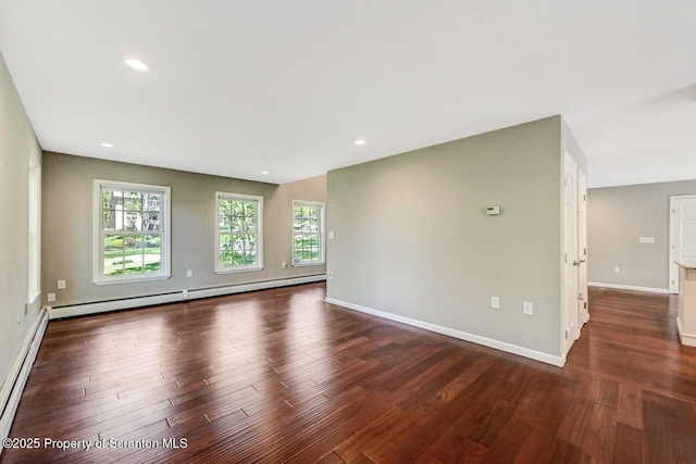 27 Emerson Dr, Moosic, PA 18507 - empty room featuring a baseboard radiator, dark wood-style floors, plenty of natural light, baseboards, and recessed lighting