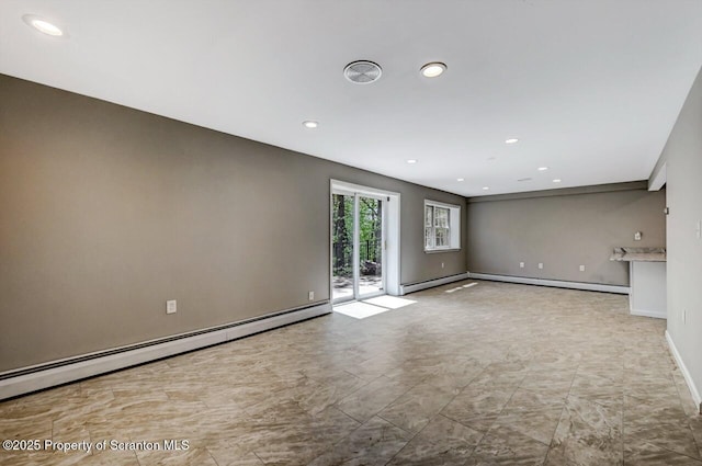 27 Emerson Dr, Moosic, PA 18507 - empty room featuring a baseboard heating unit, recessed lighting, and baseboards