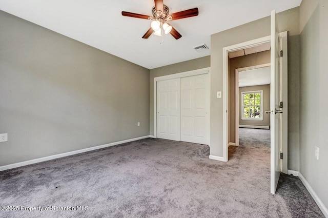 27 Emerson Dr, Moosic, PA 18507 - unfurnished bedroom featuring carpet flooring, baseboards, a closet, and ceiling fan