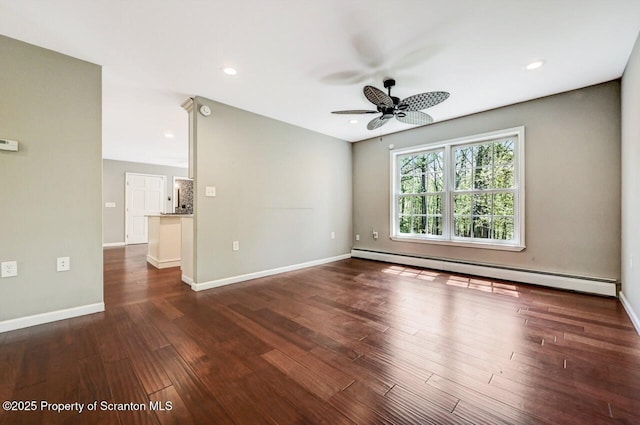 27 Emerson Dr, Moosic, PA 18507 - spare room featuring a baseboard radiator, ceiling fan, wood finished floors, baseboards, and recessed lighting