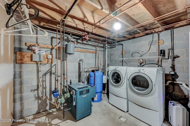 27 Emerson Dr, Moosic, PA 18507 - laundry room with washing machine and dryer and a heating unit