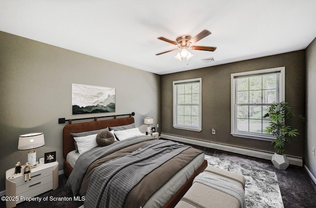 27 Emerson Dr, Moosic, PA 18507 - bedroom featuring a baseboard heating unit, baseboards, carpet, and a ceiling fan