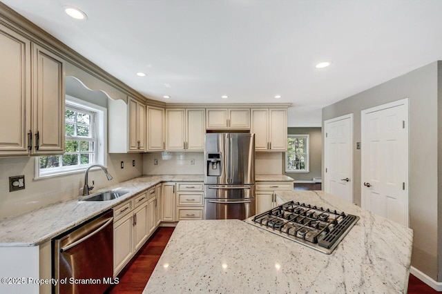 27 Emerson Dr, Moosic, PA 18507 - kitchen with stainless steel appliances, a sink, cream cabinets, light stone counters, and recessed lighting