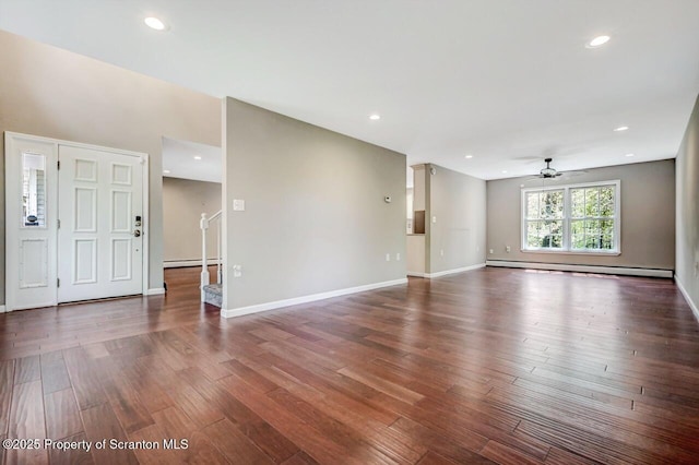 27 Emerson Dr, Moosic, PA 18507 - unfurnished living room featuring a baseboard radiator, a baseboard heating unit, a ceiling fan, hardwood / wood-style flooring, and baseboards