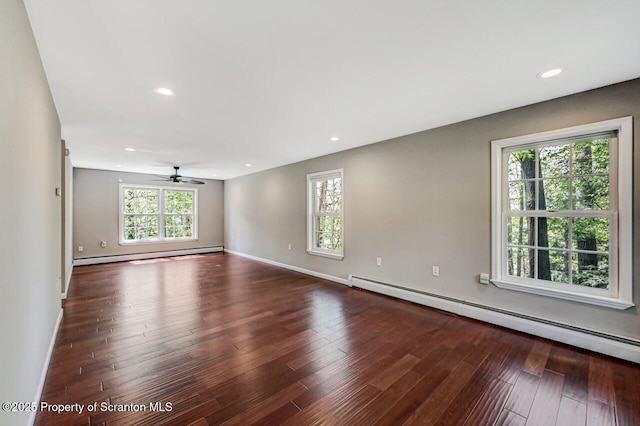 27 Emerson Dr, Moosic, PA 18507 - empty room featuring a baseboard radiator, wood-type flooring, ceiling fan, baseboards, and recessed lighting