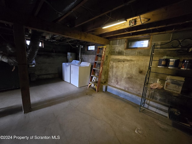 basement featuring washer and clothes dryer