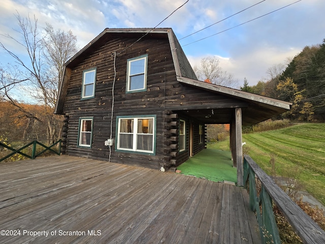 deck featuring a yard