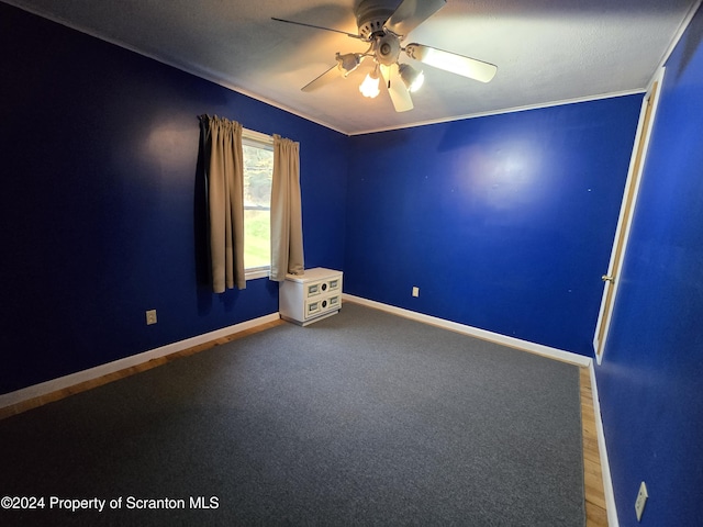 spare room with ceiling fan