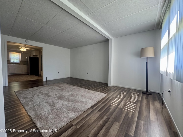 633 Thomas St, Eynon, PA 18403 - unfurnished room featuring a drop ceiling and dark wood-style floors
