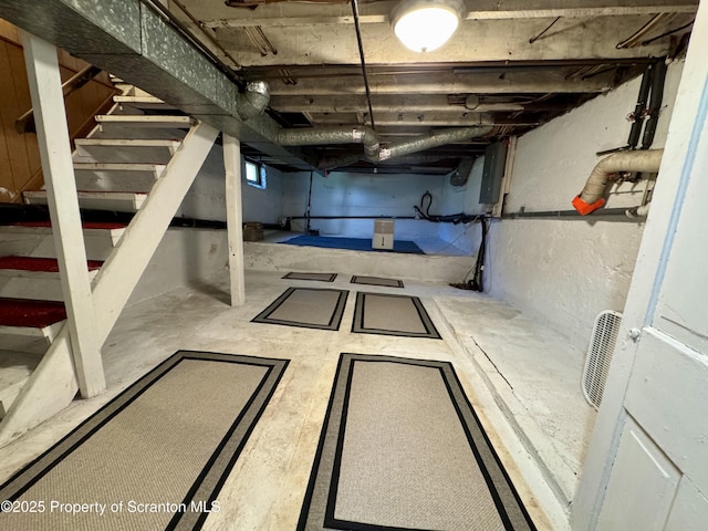 633 Thomas St, Eynon, PA 18403 - unfinished basement featuring stairs and electric panel