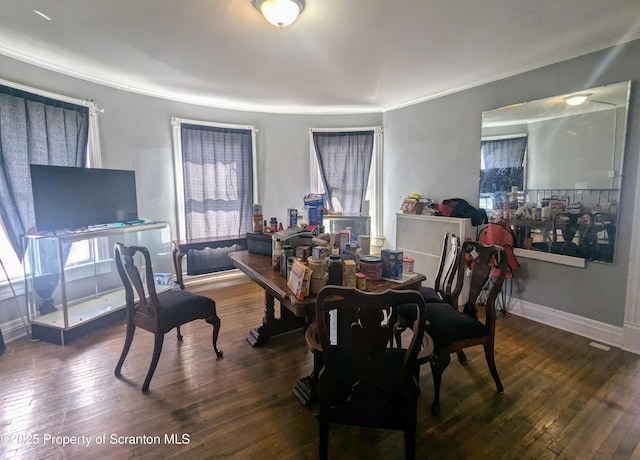 1310 Washburn St, Scranton, PA 18504 - dining space featuring wood finished floors, ornamental molding, and baseboards
